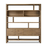 Featuring Noeline Worn Oak Wide Bookcase by Four Hands at Amethyst Home. Made from solid oak and oak veneer, a wide bookcase offers open and concealed shelving, for both storage and display. Push-latch doors make for a clean, seamless look, while subtly rounded corners soften up the whole look.Overall Dimensions: 84.00"w x 18.00"d x 94.00"hWeight : 500.44 lbsMaterials : Solid Oak, Oa. Amethyst Home provides interior design, new construction, custom furniture, and area rugs in the Austin metro area