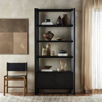 Featuring Orwin Smoked Black Oak Bookshelf by Four Hands at Amethyst Home. A stunner from every angle. Crafted from a mix of solid oak and thick oak veneer, this generous bookcase features chamfered edges along the shelves and angled outer legs for lots of movement. Finished in a smoked black oak finish.Overall Dimensions: 44.00"w x 18.00"d x 94.00"hWeight : 253.53 lbsMaterials : . Amethyst Home provides interior design, new construction, custom furniture, and area rugs in the Calabasas metro area
