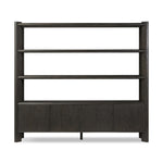 Featuring Orwin Smoked Black Oak Wide Bookshelf by Four Hands at Amethyst Home. A stunner from every angle. Crafted from a mix of solid oak and thick oak veneer, this overscale bookcase features chamfered edges along the shelves and angled outer legs for lots of movement. Finished in a smoked black oak.Overall Dimensions: 84.00"w x 18.00"d x 77.00"hWeight : 326.28 lbsMaterials : S. Amethyst Home provides interior design, new construction, custom furniture, and area rugs in the Park City metro area