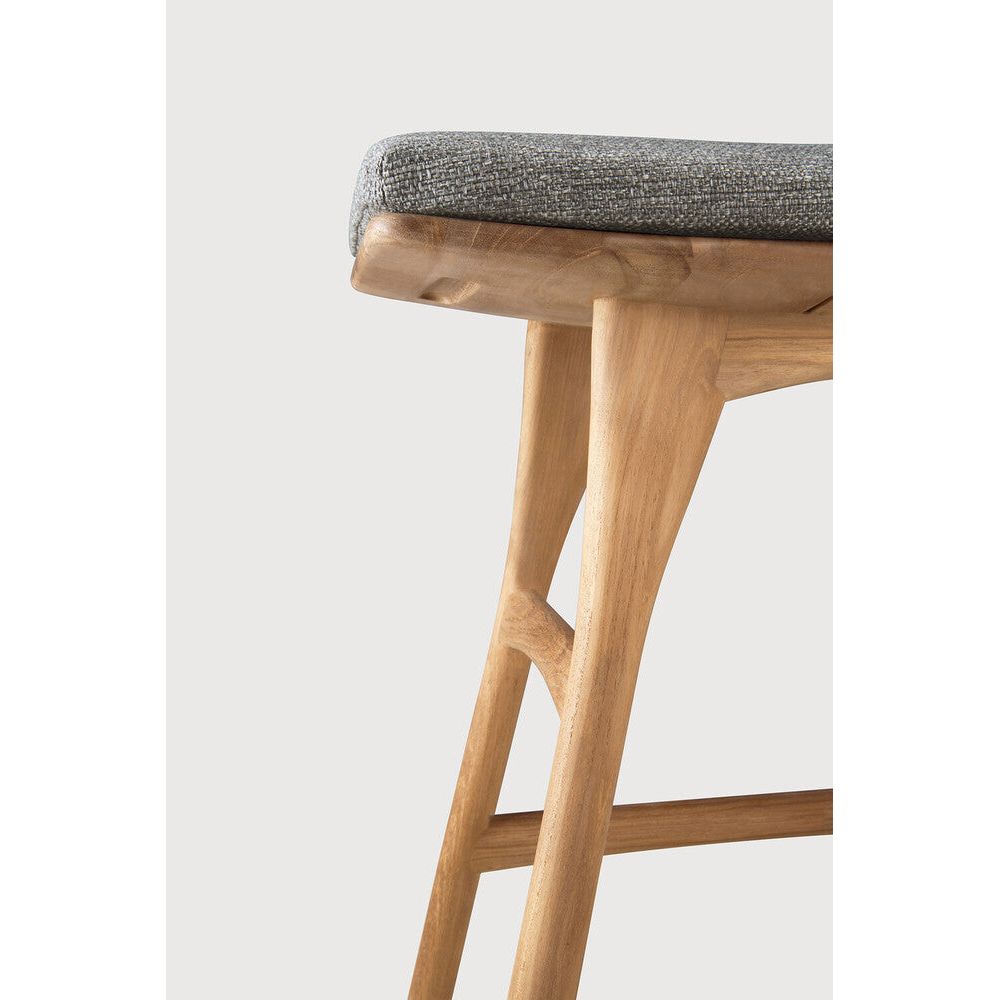 Featuring Osso Mocha Teak Outdoor Stool by Ethnicraft at Amethyst Home. The beauty of balance and symmetry found in nature has inspired the Osso collection. This solid teak stool takes quality and comfortable seating design outdoors. Use with or without seat cushion.Weight : 9 lb Dimensions: 13 in W x 20 in L x 20.5 in HBrushed : NoCollection : OssoFloor Protector : YesMain Ma. Amethyst Home provides interior design, new construction, custom furniture, and area rugs in the Newport Beach metro area