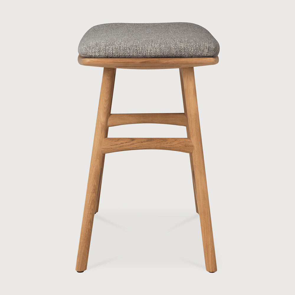 Featuring Osso Mocha Teak Outdoor Stool by Ethnicraft at Amethyst Home. The beauty of balance and symmetry found in nature has inspired the Osso collection. This solid teak stool takes quality and comfortable seating design outdoors. Use with or without seat cushion.Weight : 9 lb Dimensions: 13 in W x 20 in L x 20.5 in HBrushed : NoCollection : OssoFloor Protector : YesMain Mater. Amethyst Home provides interior design, new construction, custom furniture, and area rugs in the Washington metro area