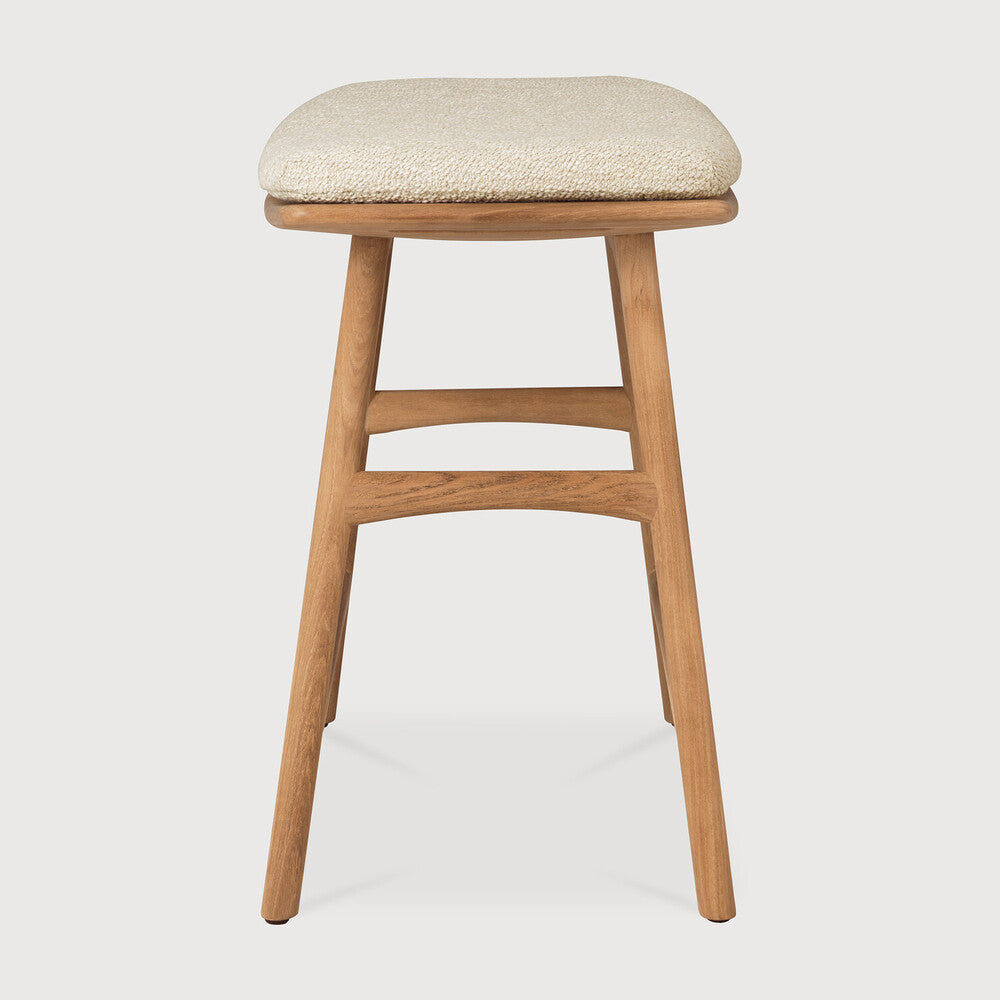 Featuring Osso Natural Teak Outdoor Stool by Ethnicraft at Amethyst Home. The beauty of balance and symmetry found in nature has inspired the Osso collection. This solid teak stool takes quality and comfortable seating design outdoors. Use with or without seat cushion.Weight : 9 lb Dimensions: 13 in W x 20 in L x 20.5 in HBrushed : NoCollection : OssoFloor Protector : YesMain Mat. Amethyst Home provides interior design, new construction, custom furniture, and area rugs in the Washington metro area
