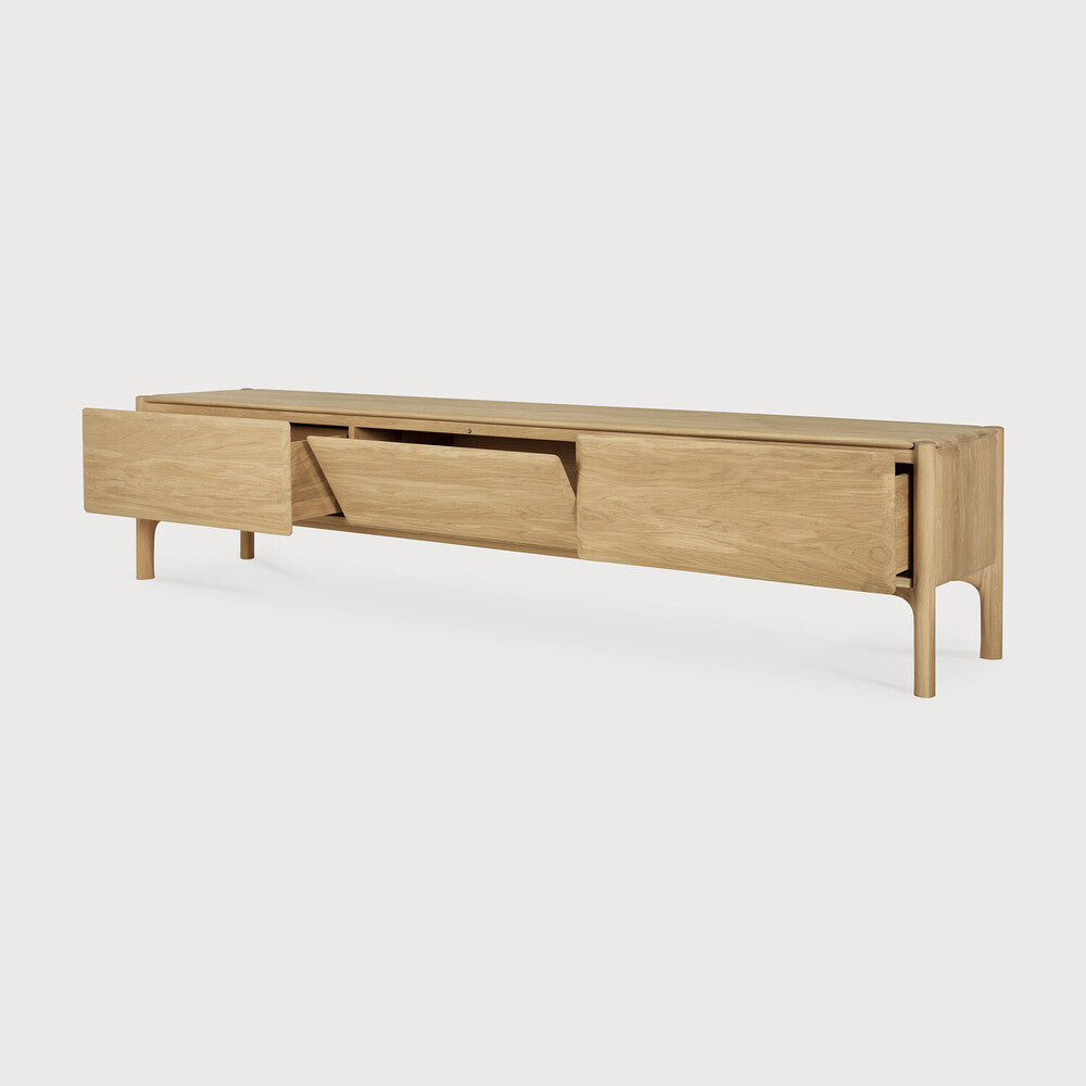 Featuring Pi Oak Tv Cupboard by Ethnicraft at Amethyst Home. The PI collection honours nature’s design by keeping the strength, curves and lines, as nature intended. Interesting shapes are discovered in this sleek and stylish, polished imperfect, finish. Each PI item is finished by hand to ensure that the individual character of the wood is respected. The PI TV cupboard is striki. Amethyst Home provides interior design, new construction, custom furniture, and area rugs in the Scottsdale metro area