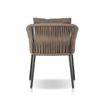 Featuring Porto Ellor Brown Outdoor Dining Chair by Four Hands at Amethyst Home. The perfect place for outdoor daydreaming. A beautiful rope-based design is woven across a durable aluminum frame in a rich bronze finish. Topped with a wide cushion and throw pillows, all upholstered in 100% olefin, known for its UV-resistant, water-repellent and quick-drying abilitiesOverall Dimensions. Amethyst Home provides interior design, new construction, custom furniture, and area rugs in the Boston metro area