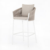 Featuring Porto Faye Sand Outdoor Bar & Counter Stool by Four Hands at Amethyst Home. Add a dash of modernity to outdoor dining. Finished in a crisp, clean white, linear aluminum framing welcomes weather-resistant sand-colored cushioning, for a fresh, fluid look. Cover or store indoors during inclement weather and when not in use.Bar StoolOverall Dimensions: 22.50"w x 22.75"d x 45.00". Amethyst Home provides interior design, new construction, custom furniture, and area rugs in the Miami metro area
