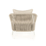 Featuring Porto Faye Sand Outdoor Chair by Four Hands at Amethyst Home. The perfect place for outdoor daydreaming. A beautiful rope-based design is woven across a durable aluminum frame. Topped with a wide cushion and throw pillow, all upholstered in 100% olefin, known for its UV-resistant, water-repellent and quick-drying abilities. Cover or store indoors during inclement weather an. Amethyst Home provides interior design, new construction, custom furniture, and area rugs in the Boston metro area