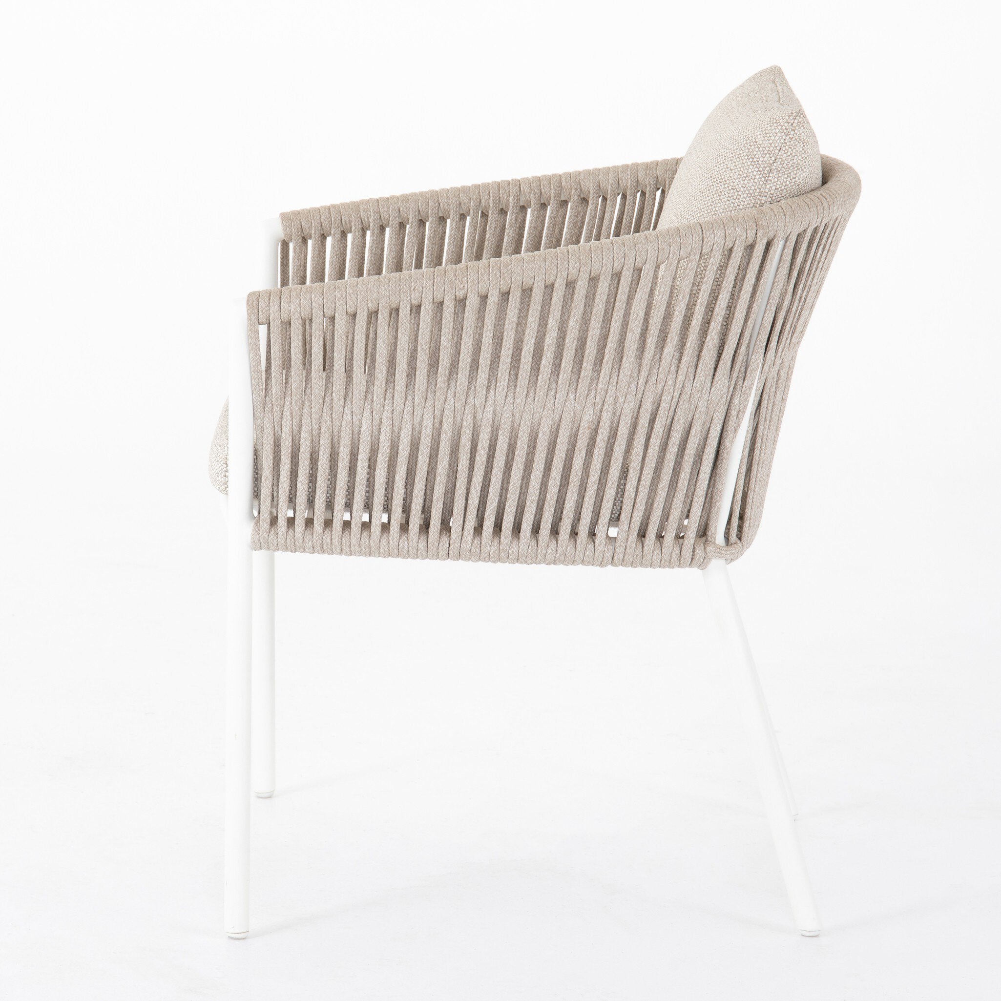Featuring Porto Faye Sand Outdoor Dining Chair by Four Hands at Amethyst Home. Add a dash of modernity to outdoor dining. Finished in a crisp, clean white, linear aluminum framing welcomes weather-resistant sand-colored cushioning, for a fresh, fluid look. Cover or store indoors during inclement weather and when not in use.Overall Dimensions: 25.50"w x 25.50"d x 32.00"hWeight : 18. Amethyst Home provides interior design, new construction, custom furniture, and area rugs in the Charlotte metro area