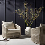 Featuring Porto Faye Sand Outdoor Swivel Chair by Four Hands at Amethyst Home. A beautiful rope-based design is woven across a durable, 360-swivel aluminum frame in a rich bronze finish. Topped with a wide cushion and throw pillow, all upholstered in 100% olefin, known for its UV-resistant, water-repellent and quick-drying abilities. Cover or store indoors during inclement wea. Amethyst Home provides interior design, new construction, custom furniture, and area rugs in the Winter Garden metro area