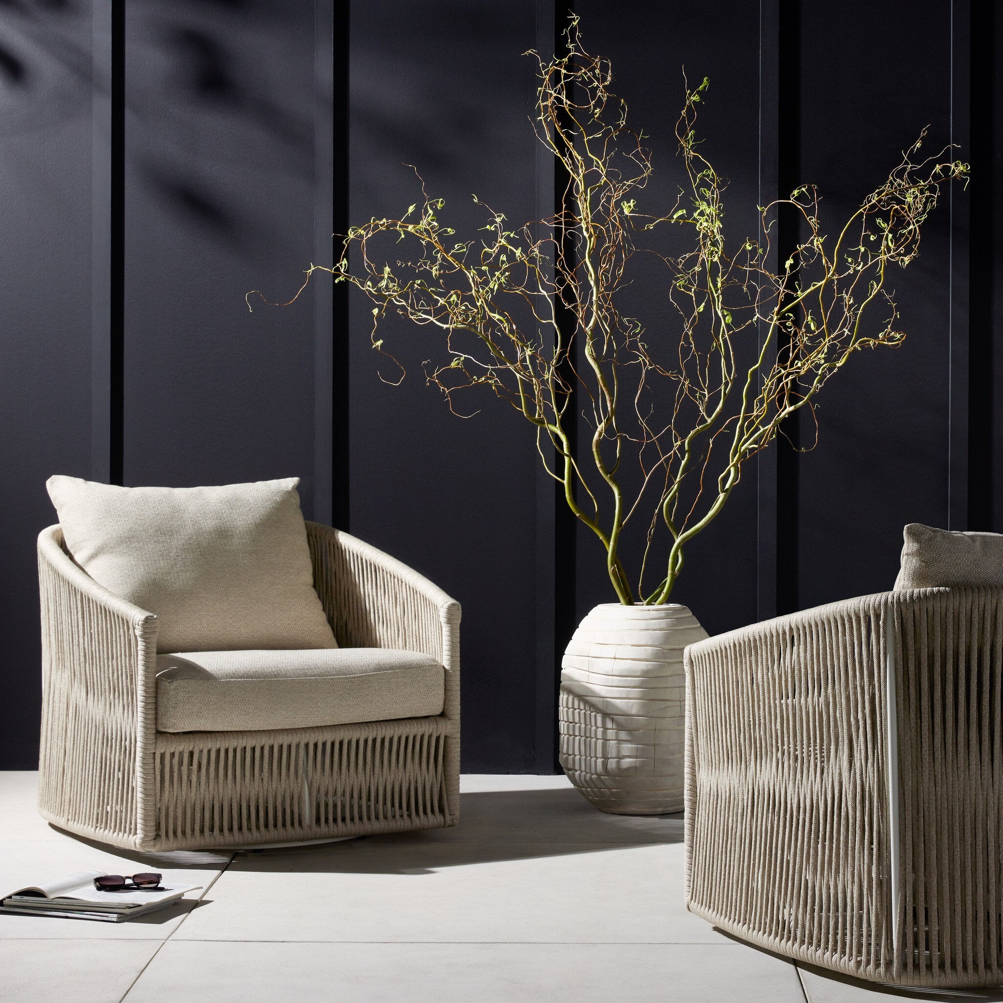 Featuring Porto Faye Sand Outdoor Swivel Chair by Four Hands at Amethyst Home. A beautiful rope-based design is woven across a durable, 360-swivel aluminum frame in a rich bronze finish. Topped with a wide cushion and throw pillow, all upholstered in 100% olefin, known for its UV-resistant, water-repellent and quick-drying abilities. Cover or store indoors during inclement wea. Amethyst Home provides interior design, new construction, custom furniture, and area rugs in the Winter Garden metro area
