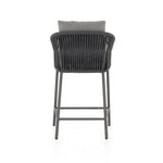 Featuring Porto Venao Charcoal Outdoor Bar & Counter Stool by Four Hands at Amethyst Home. The perfect place for outdoor daydreaming. A beautiful rope-based design is woven across a durable aluminum frame in a rich bronze finish. Topped with a wide cushion and throw pillows, all upholstered in 100% olefin, known for its UV-resistant, water-repellent and quick-drying abilitiesBar Stoo. Amethyst Home provides interior design, new construction, custom furniture, and area rugs in the Austin metro area