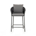 Featuring Porto Venao Charcoal Outdoor Bar & Counter Stool by Four Hands at Amethyst Home. The perfect place for outdoor daydreaming. A beautiful rope-based design is woven across a durable aluminum frame in a rich bronze finish. Topped with a wide cushion and throw pillows, all upholstered in 100% olefin, known for its UV-resistant, water-repellent and quick-drying abilitiesBar S. Amethyst Home provides interior design, new construction, custom furniture, and area rugs in the Calabasas metro area