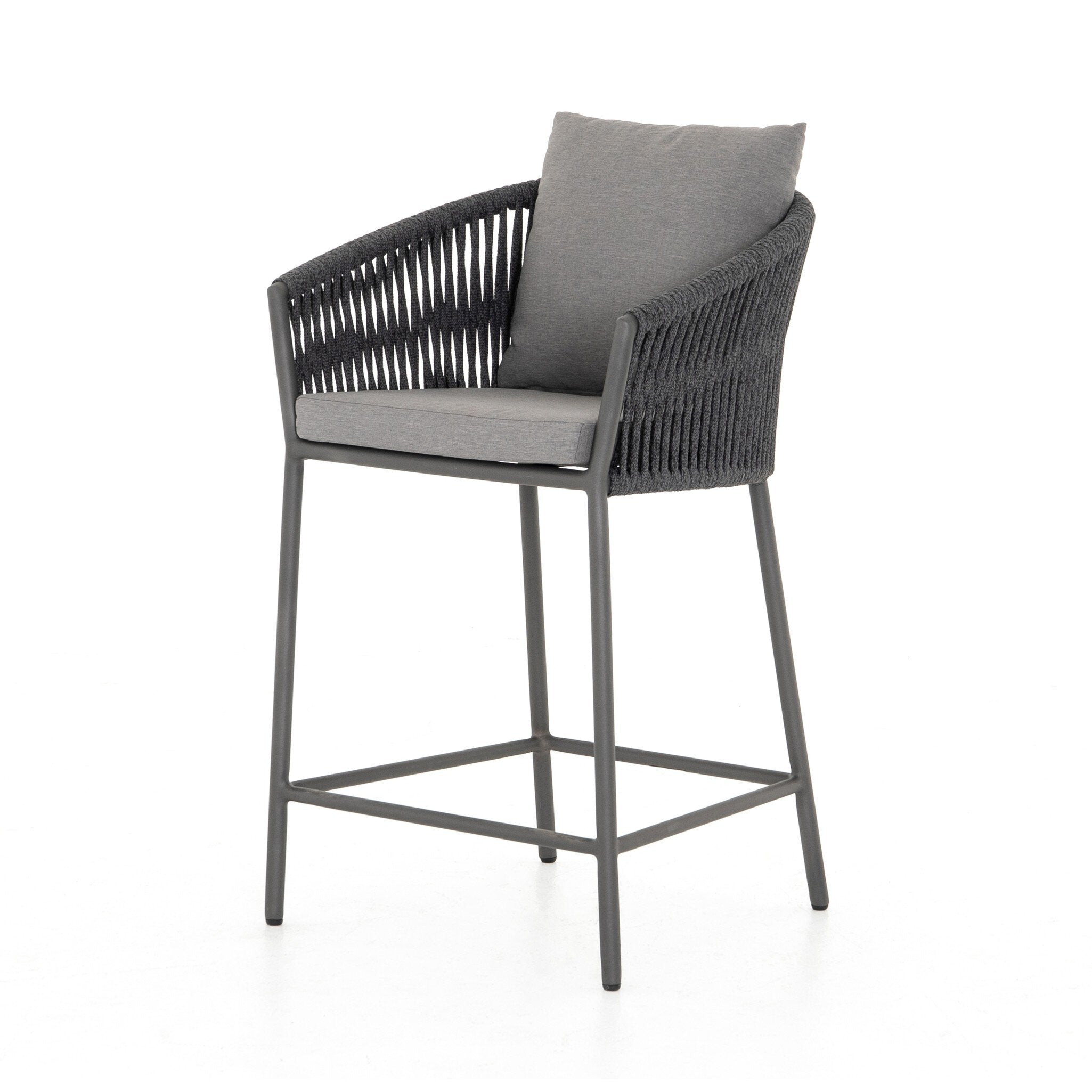 Featuring Porto Venao Charcoal Outdoor Bar & Counter Stool by Four Hands at Amethyst Home. The perfect place for outdoor daydreaming. A beautiful rope-based design is woven across a durable aluminum frame in a rich bronze finish. Topped with a wide cushion and throw pillows, all upholstered in 100% olefin, known for its UV-resistant, water-repellent and quick-drying abilitiesBar Stool. Amethyst Home provides interior design, new construction, custom furniture, and area rugs in the Miami metro area