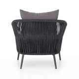 Featuring Porto Venao Charcoal Outdoor Chair by Four Hands at Amethyst Home. The perfect place for outdoor daydreaming. A beautiful rope-based design is woven across a durable aluminum frame in a rich bronze finish. Topped with a wide cushion and throw pillow, all upholstered in 100% olefin, known for its UV-resistant, water-repellent and quick-drying abilities. Cover or store indo. Amethyst Home provides interior design, new construction, custom furniture, and area rugs in the Monterey metro area