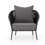 Featuring Porto Venao Charcoal Outdoor Chair by Four Hands at Amethyst Home. The perfect place for outdoor daydreaming. A beautiful rope-based design is woven across a durable aluminum frame in a rich bronze finish. Topped with a wide cushion and throw pillow, all upholstered in 100% olefin, known for its UV-resistant, water-repellent and quick-drying abilities. Cover or store indoo. Amethyst Home provides interior design, new construction, custom furniture, and area rugs in the Seattle metro area