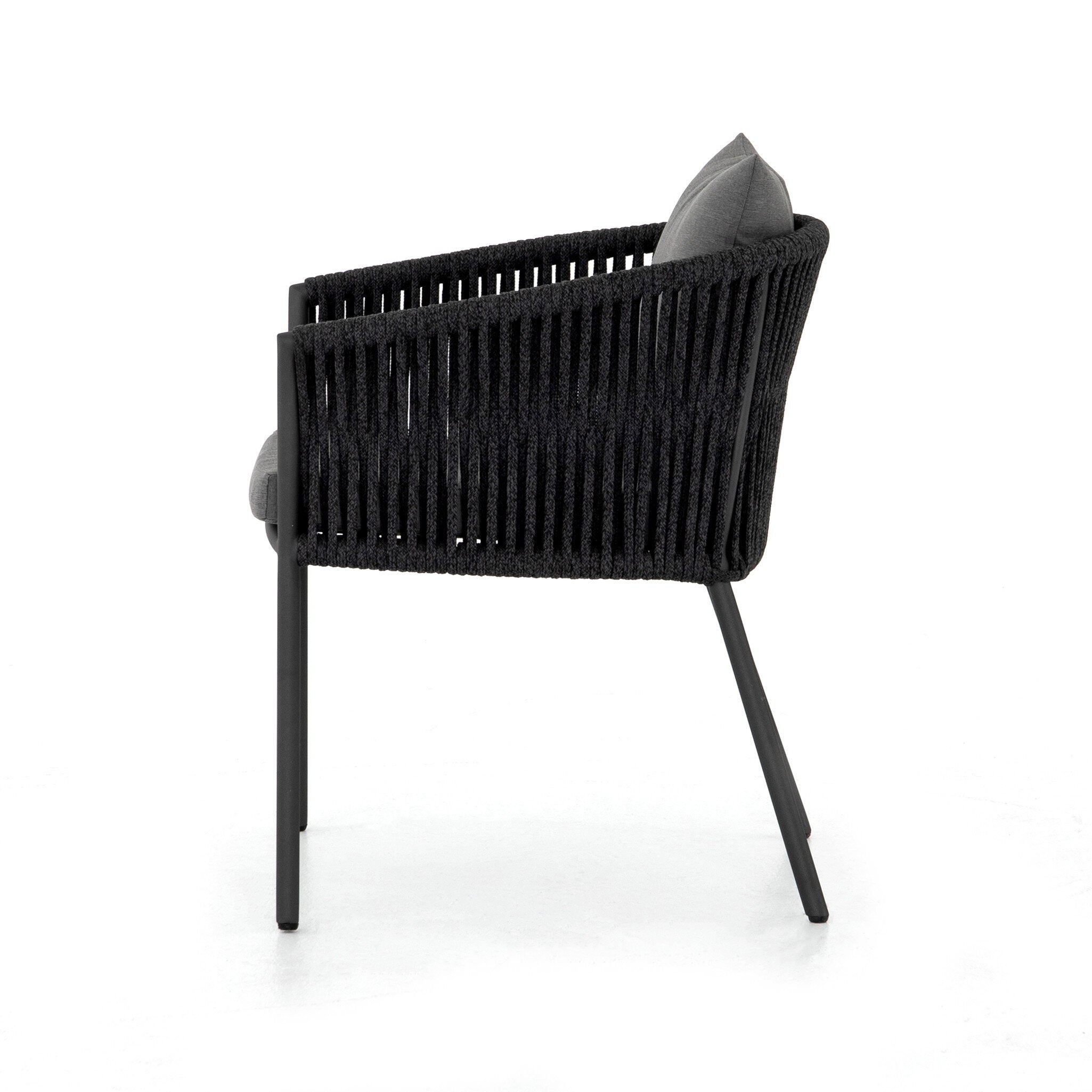 Featuring Porto Venao Charcoal Outdoor Dining Chair by Four Hands at Amethyst Home. The perfect place for outdoor daydreaming. A beautiful rope-based design is woven across a durable aluminum frame in a rich bronze finish. Topped with a wide cushion and throw pillows, all upholstered in 100% olefin, known for its UV-resistant, water-repellent and quick-drying abilitiesOverall Dimensi. Amethyst Home provides interior design, new construction, custom furniture, and area rugs in the Austin metro area