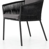 Featuring Porto Venao Charcoal Outdoor Dining Chair by Four Hands at Amethyst Home. The perfect place for outdoor daydreaming. A beautiful rope-based design is woven across a durable aluminum frame in a rich bronze finish. Topped with a wide cushion and throw pillows, all upholstered in 100% olefin, known for its UV-resistant, water-repellent and quick-drying abilitiesOverall Dimensi. Amethyst Home provides interior design, new construction, custom furniture, and area rugs in the Boston metro area