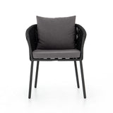 Featuring Porto Venao Charcoal Outdoor Dining Chair by Four Hands at Amethyst Home. The perfect place for outdoor daydreaming. A beautiful rope-based design is woven across a durable aluminum frame in a rich bronze finish. Topped with a wide cushion and throw pillows, all upholstered in 100% olefin, known for its UV-resistant, water-repellent and quick-drying abilitiesOverall . Amethyst Home provides interior design, new construction, custom furniture, and area rugs in the Newport Beach metro area