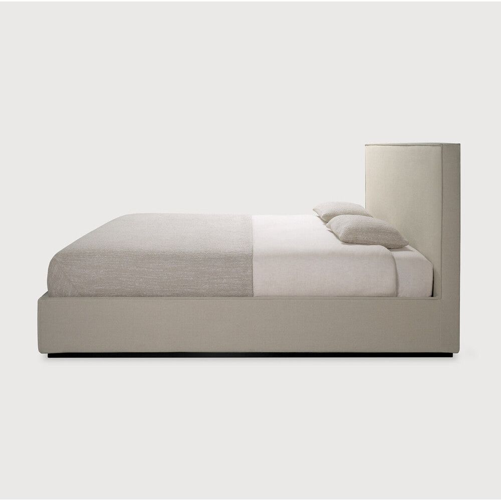 Featuring Revive Removable Linen Sand Bed by Ethnicraft at Amethyst Home. Find solace in the Revive bed, where comfort meets practicality. Its linen headboard, effortlessly removable for dry cleaning, ensures a fresh and inviting space. Stitched details add a touch of refined elegance and create a soft backdrop that whispers tranquility into the bedroom.Overall Dimensions: 85.5". Amethyst Home provides interior design, new construction, custom furniture, and area rugs in the Los Angeles metro area