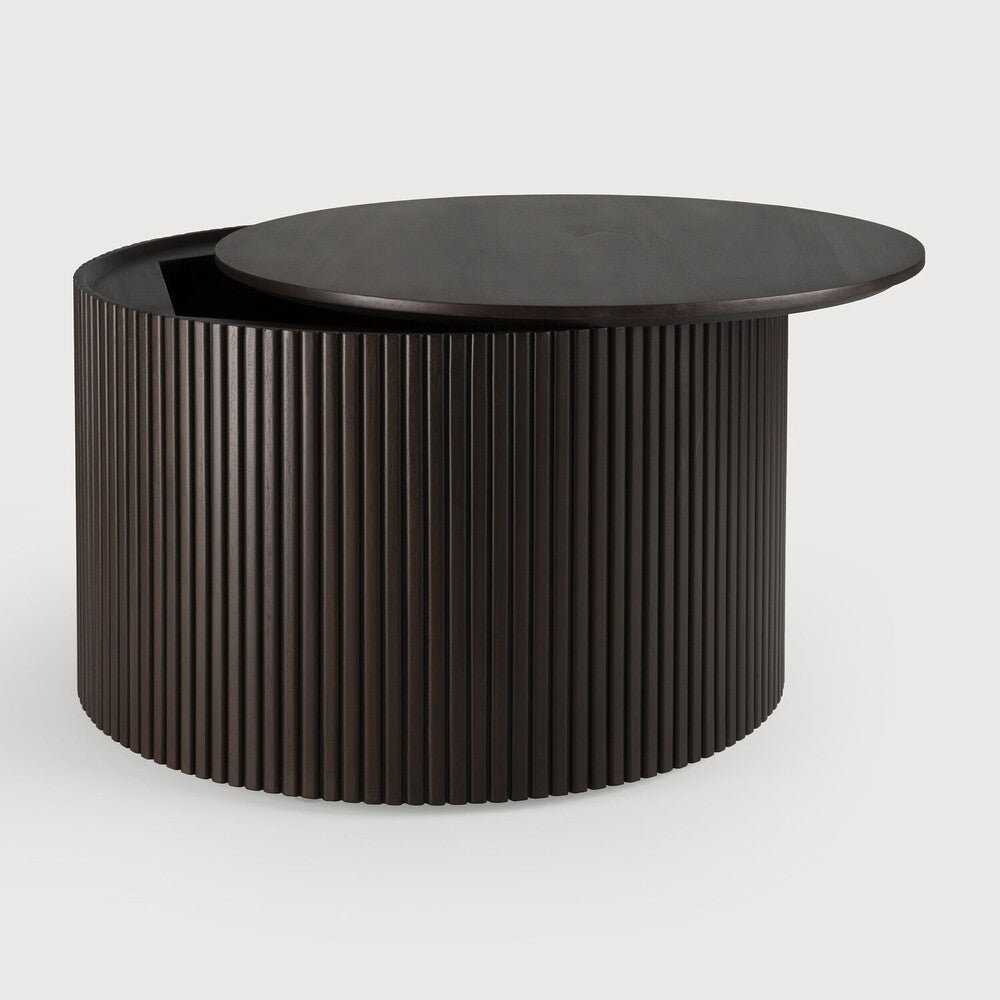 Designed by Jacques Deneef, the Roller Max is a clever multifunctional item that combines a coffee table with storage.  Encapsulated in its stacked wood-stick effect, the tabletop can be easily removed to hide the newspapers, toys, cushions and throws from daily life. The perfect solution for smaller living.

The tabletop can be removed to store objects inside the table. Amethyst Home provides interior design, new construction, custom furniture, and area rugs in the Boston metro area
