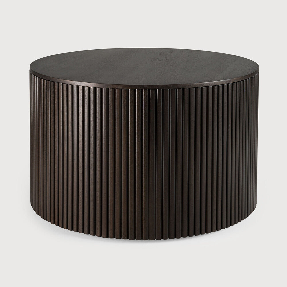 Designed by Jacques Deneef, the Roller Max is a clever multifunctional item that combines a coffee table with storage.  Encapsulated in its stacked wood-stick effect, the tabletop can be easily removed to hide the newspapers, toys, cushions and throws from daily life. The perfect solution for smaller living.

The tabletop can be removed to store objects inside the table. Amethyst Home provides interior design, new construction, custom furniture, and area rugs in the Nashville metro area