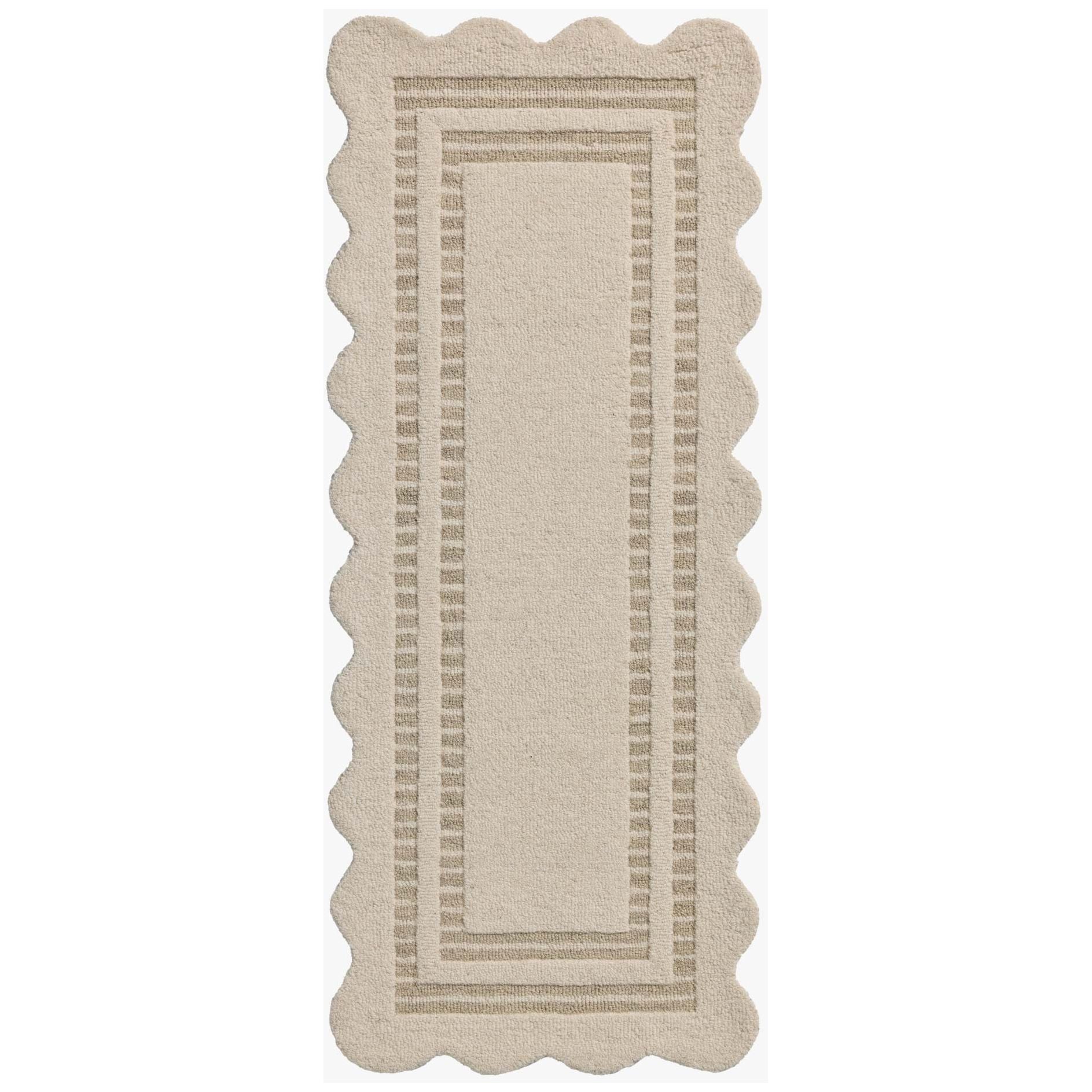Featuring Chris Loves Julia × Loloi Scottie Ivory / Grey Rug by Loloi at Amethyst Home. The Scottie Collection from Chris Loves Julia x Loloi is a hand-tufted wool area rug with a playful scalloped edge and lower-pile, striped border for a touch of structure. The rugs overall pile is thick and plush, available in easygoing earth tones and neutral colo.  Amethyst Home provides interior design, new home construction design consulting, vintage area rugs, and lighting in the Salt Lake City metro area.