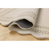 Featuring Chris Loves Julia × Loloi Scottie Ivory / Grey Rug by Loloi at Amethyst Home. The Scottie Collection from Chris Loves Julia x Loloi is a hand-tufted wool area rug with a playful scalloped edge and lower-pile, striped border for a touch of structure. The rugs overall pile is thick and plush, available in easygoing earth tones and neutral colo.  Amethyst Home provides interior design, new home construction design consulting, vintage area rugs, and lighting in the Salt Lake City metro area.