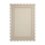 Featuring Chris Loves Julia × Loloi Scottie Ivory / Grey Rug by Loloi at Amethyst Home. The Scottie Collection from Chris Loves Julia x Loloi is a hand-tufted wool area rug with a playful scalloped edge and lower-pile, striped border for a touch of structure. The rugs overall pile is thick and plush, available in easygoing earth tones and neutral colorwa.  Amethyst Home provides interior design, new home construction design consulting, vintage area rugs, and lighting in the Kansas City metro area.