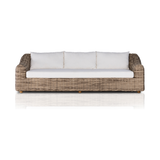 Traditional heritage shape on a grand scale. An outdoor dining sofa is crafted from durable natural teak in a gorgeous, woven pattern highlighting the texture's natural highs and lows. Oversized with deep-seated comfort with loose pillows for the ultimate outdoor lounge. Cover or store indoors during inclement weather and when not in use. Amethyst Home provides interior design, new construction, custom furniture and area rugs in the New Orleans metro area
