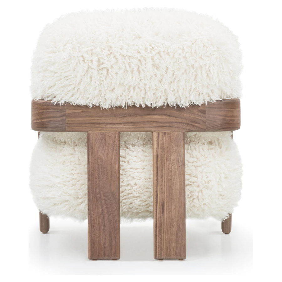 A signature Walnut frame with the coziest vegan sheepskin -- the Elodie chair is the latest dreamy introduction by Verellen. Amethyst Home provides interior design, new home construction design consulting, vintage area rugs, and lighting in the Charlotte metro area.