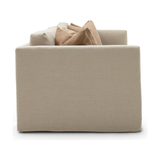 The Millie Sofa is known for it's clean & couture style linen slipcover.  Beautifully timeless and ultra luxe comfort. Amethyst Home provides interior design, new home construction design consulting, vintage area rugs, and lighting in the Miami metro area.