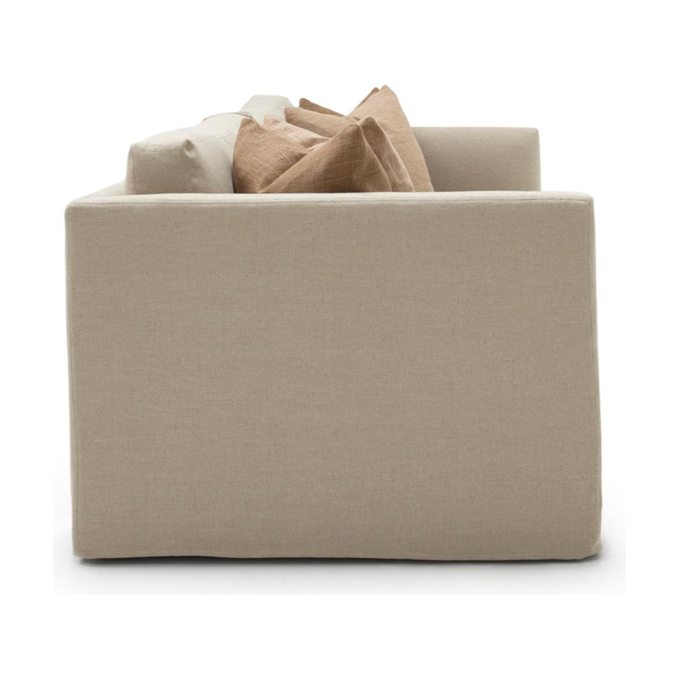 The Millie Sofa is known for it's clean & couture style linen slipcover.  Beautifully timeless and ultra luxe comfort. Amethyst Home provides interior design, new home construction design consulting, vintage area rugs, and lighting in the Miami metro area.