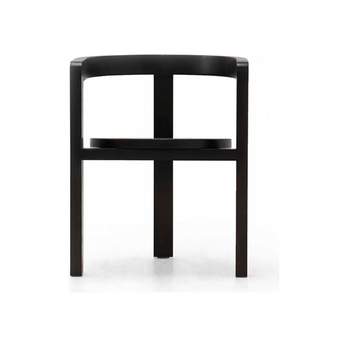 An innovative, sleek dining chair by the designers at Verellen.  Hidden, recessed casters provide a smooth glide at your favorite dining table.  Made of solid Ash wood in a black, ebonized finish. Amethyst Home provides interior design, new home construction design consulting, vintage area rugs, and lighting in the Austin metro area.