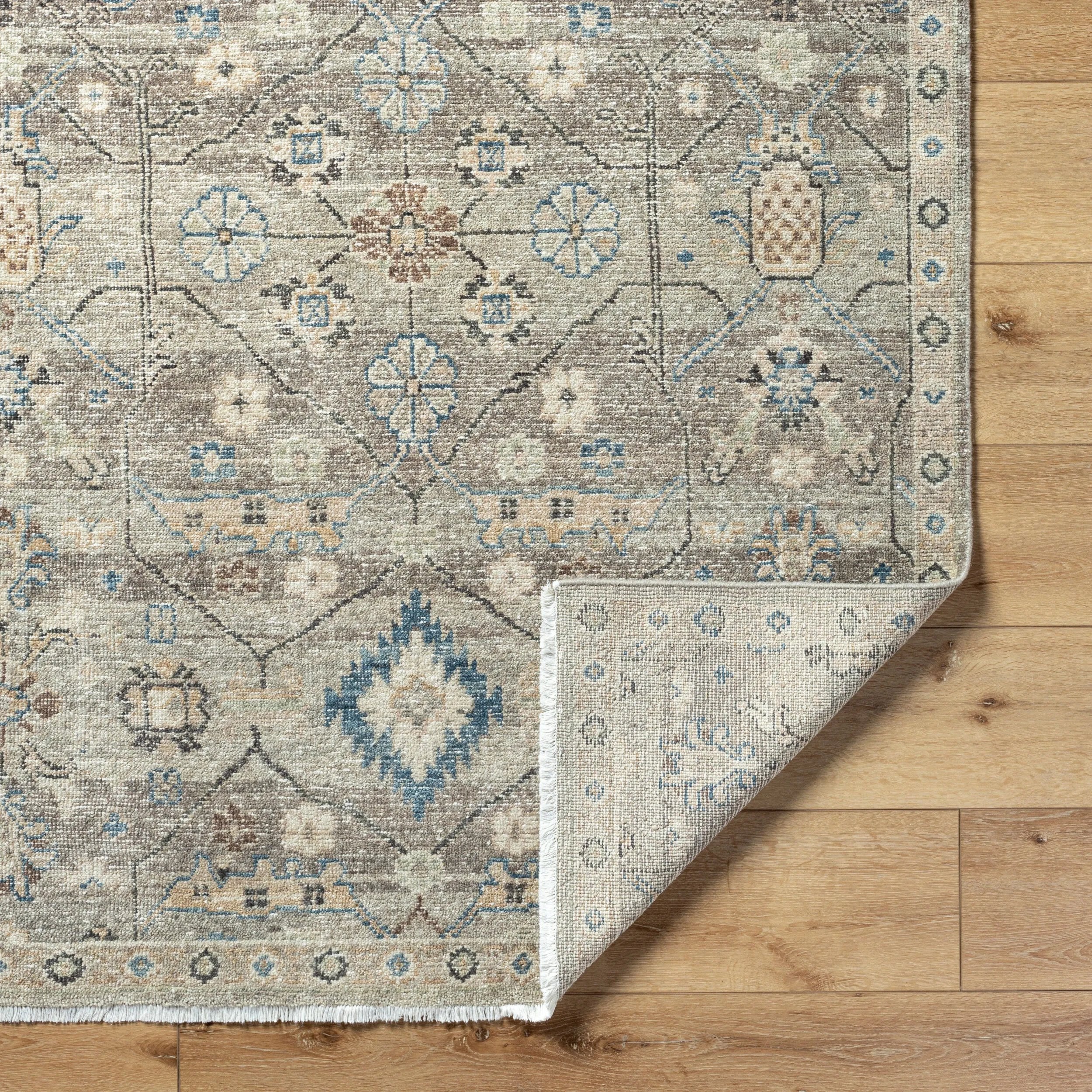 Featuring Anelka Hand-Knotted Rug by Surya at Amethyst Home. Indulge in luxury with the Anelka Hand-Knotted Rug. Skillfully crafted by hand, this exquisite rug brings an air of sophistication and elegance to any space. Made with the finest materials, it offers unparalleled softness and durability. Upgrade your home with this premium addition that transcends m. Amethyst Home provides interior design, new home construction design consulting, vintage area rugs, and lighting in the Seattle metro area.