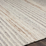 This Bremen area rug will add a unique, global flair to any room in your home. Hand-woven with 100% wool in India, this contemporary-style piece features no pile construction for easy maintenance and cleaning. Rug pad recommended for added comfort and stability. Spot clean only for simple upkeep. Amethyst Home provides interior design, new home construction design consulting, vintage area rugs, and lighting in the Portland metro area.
