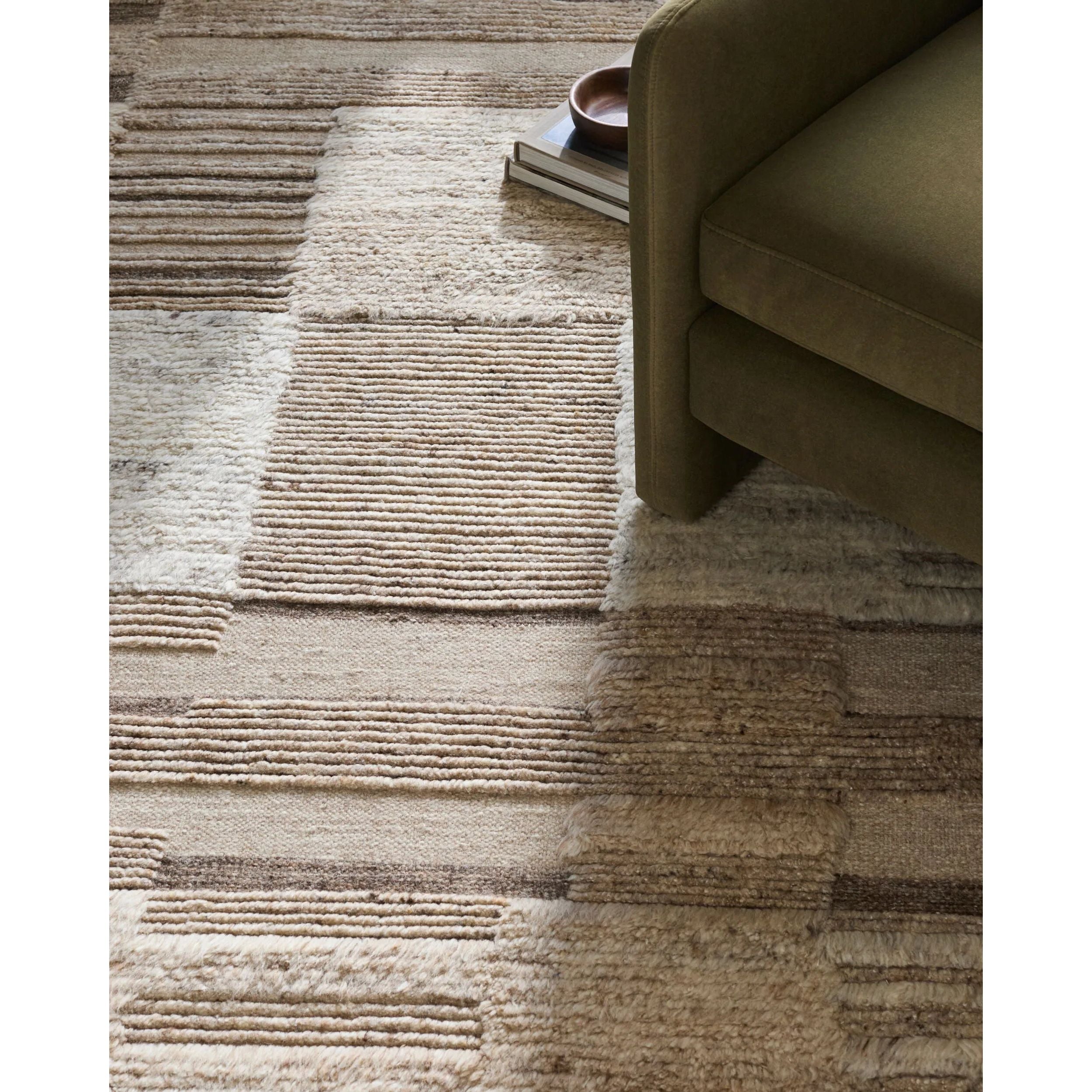 Immerse yourself in the world of Art Deco Modern style with our Folklore collection handmade rug. Made with love and care in India, this luxurious high pile wool rug is expertly hand-knotted, offering a remarkable texture underfoot that will transform any room into a cozy and inviting space. Amethyst Home provides interior design, new home construction design consulting, vintage area rugs, and lighting in the Kansas City metro area.