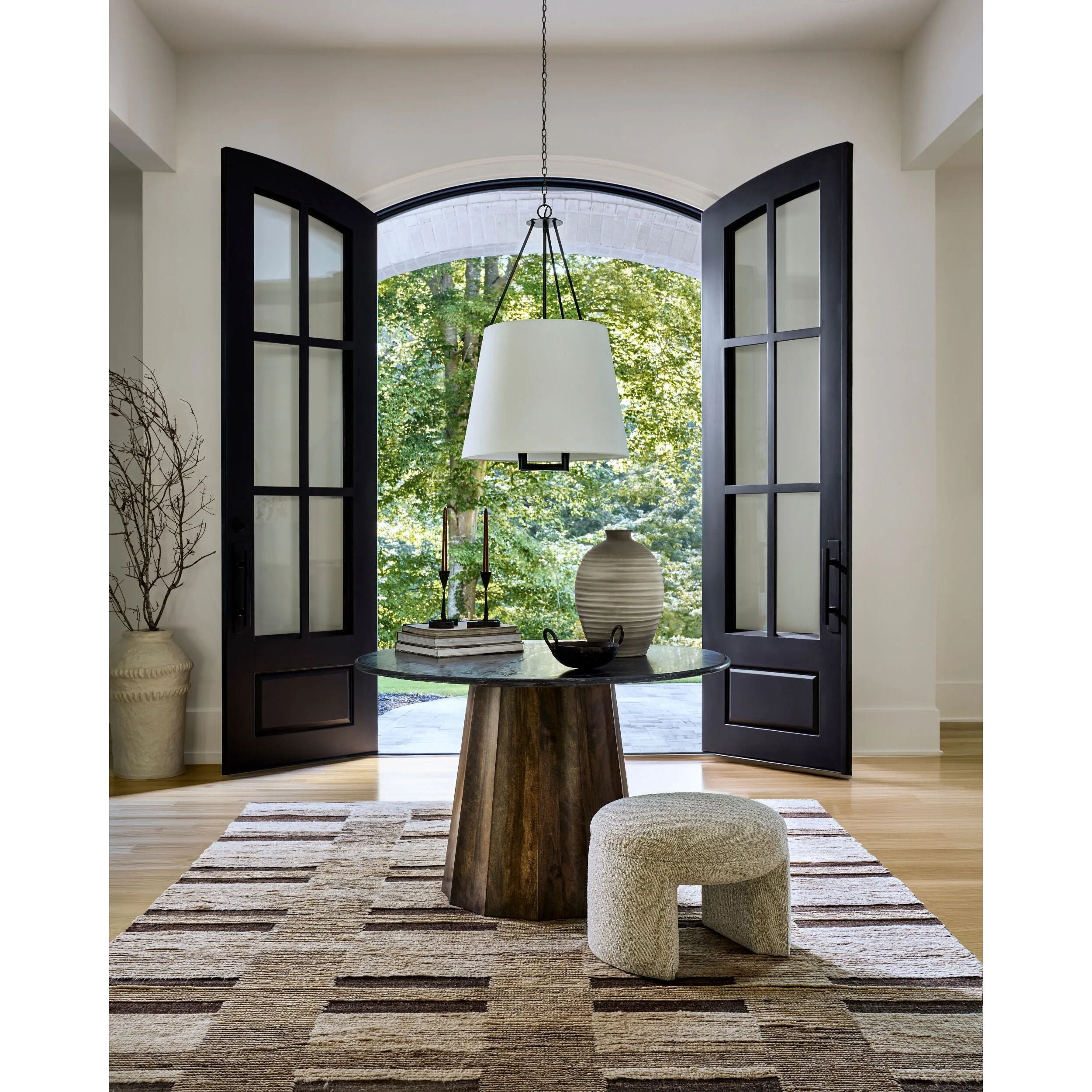 Elevate your living space with the Folklore handmade rug. Fashioned in an Art Deco Modern style, this Indian manufactured woolen wonder brings a unique flair to any room it graces. The hand-knotted construction promises high pile comfort underfoot, making every step a plush experience. Amethyst Home provides interior design, new home construction design consulting, vintage area rugs, and lighting in the Salt Lake City metro area.