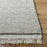 Introducing the Mabel Collection, where Country Cottage meets chic comfort. This handmade rug boasts a high pile construction, hand-woven from pure wool in the heartland of India, ensuring a plush and comfortable surface to walk on. It comes with an appealing fringe detail that adds a touch of rustic charm to any room. Amethyst Home provides interior design, new home construction design consulting, vintage area rugs, and lighting in the Laguna Beach metro area.