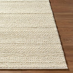 Transform your living space with the exquisite Tahoe II handmade rug, a true gem in Bohemian Global style. Crafted meticulously in India from premium wool and boasting a hand-woven construction, this unique piece exudes both charm and durability. The no-pile design makes it incredibly easy to maintain—just spot clean with water when needed. Amethyst Home provides interior design, new home construction design consulting, vintage area rugs, and lighting in the San Diego metro area.