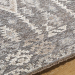 Featuring Tempe Charcoal Rug by Surya at Amethyst Home. Expertly crafted and made from high-quality materials, the Tempe Rug provides both style and functionality for any living space. Its durable construction makes it suitable for high traffic areas, while its soft texture adds warmth and comfort to your home. Enhance your decor with this versatile and timel. Amethyst Home provides interior design, new home construction design consulting, vintage area rugs, and lighting in the Houston metro area.