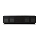 Featuring Toni Worn Black Oak Media Console by Four Hands at Amethyst Home. Grand-scale with a wide, low profile. Glass doors bookend central wood drawers, balancing display and concealed storage. Worn black finish highlights clean lines, anchoring modern spaces with understated impact.Overall Dimensions: 92.00"w x 17.00"d x 24.00"hWeight : 179.90 lbsMaterials : Solid Oak, Thick . Amethyst Home provides interior design, new construction, custom furniture, and area rugs in the Alpharetta metro area