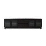 Featuring Toni Worn Black Oak Media Console by Four Hands at Amethyst Home. Grand-scale with a wide, low profile. Glass doors bookend central wood drawers, balancing display and concealed storage. Worn black finish highlights clean lines, anchoring modern spaces with understated impact.Overall Dimensions: 92.00"w x 17.00"d x 24.00"hWeight : 179.90 lbsMaterials : Solid Oak, Thick . Amethyst Home provides interior design, new construction, custom furniture, and area rugs in the Alpharetta metro area