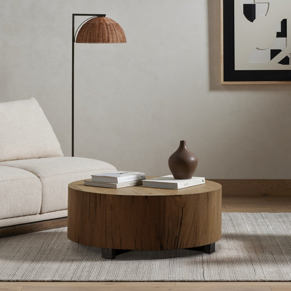 We love how the stunning forces of nature are captured in the Hudson Natural Yukas Coffee Table. Natural yukas wood is hand-shaped into a cylindrical silhouette and placed over a bronzed iron base to complete your living room space. Amethyst Home provides interior design, new home construction design consulting, vintage area rugs, and lighting in the Scottsdale metro area.