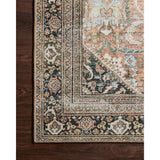 The Wynter Auburn / Multi area rug showcases a one-of-a-kind vintage or antique area rug look power-loomed of 100% polyester. This rug brings in tones of orange, brown, black, and hints of blue. The rug is ideal for high traffic areas such as living rooms, dining rooms, kitchens, hallways, and entryways.