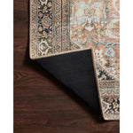 The Wynter Auburn / Multi area rug showcases a one-of-a-kind vintage or antique area rug look power-loomed of 100% polyester. This rug brings in tones of orange, brown, black, and hints of blue. The rug is ideal for high traffic areas such as living rooms, dining rooms, kitchens, hallways, and entryways.