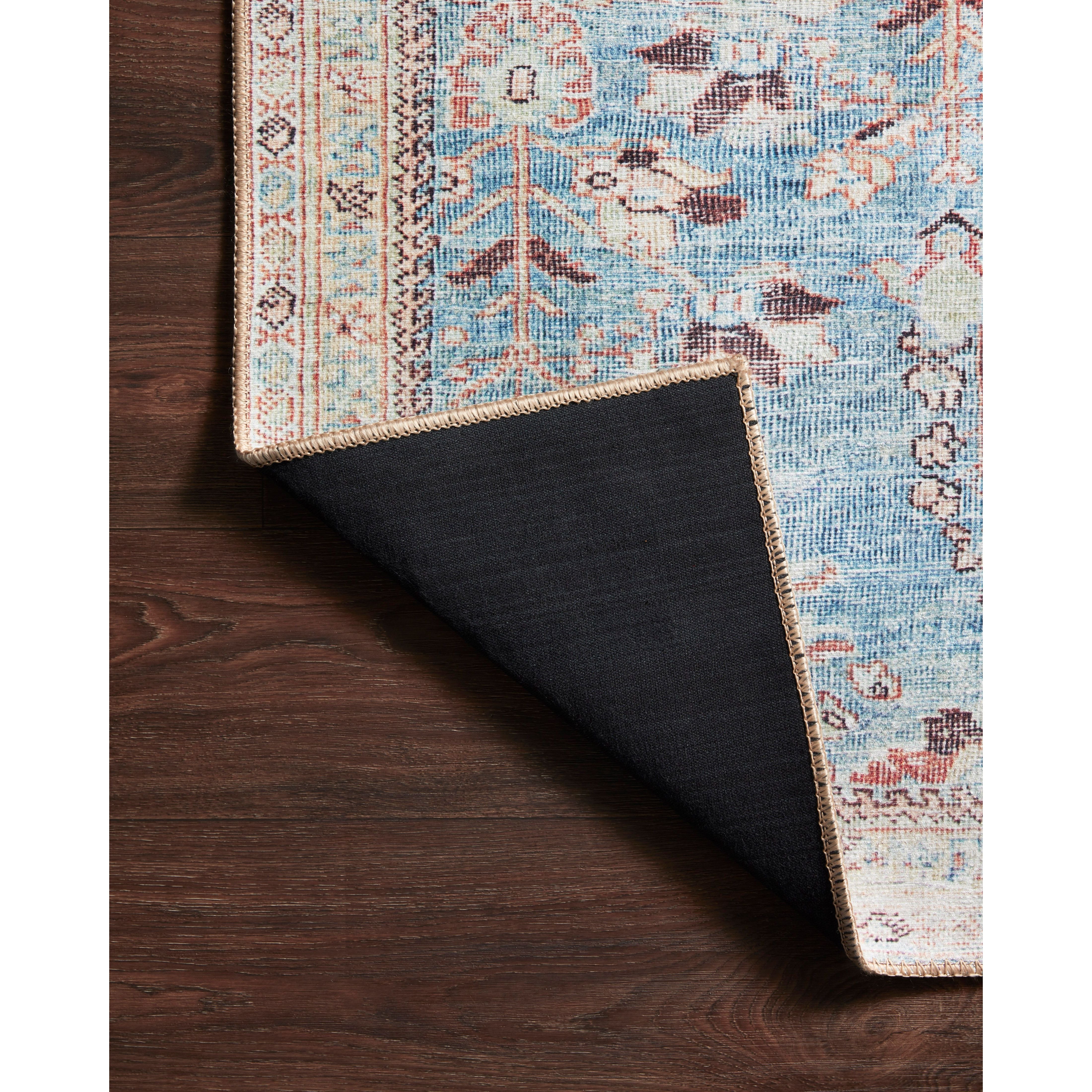 The Wynter Teal / Multi area rug showcases a one-of-a-kind vintage or antique area rug look power-loomed of 100% polyester. This rug brings in tones of blue, ivory, and pink. The rug is ideal for high traffic areas due to the rug's durability for living rooms, dining rooms, kitchens, hallways, and entryways.