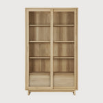 Featuring Wave Oak Cupboard by Ethnicraft at Amethyst Home. The subtle contours of the cabinet doors and the distinguished shape of the feet are what make the Wave collection so special. Made of solid wood, this storage cupboard’s doors and drawers have no handles and feature a soft closing mechanism.Weight : 256 lbs Dimensions: 18.5" W x 43.5" L x 72.5" H. Amethyst Home provides interior design, new construction, custom furniture, and area rugs in the Seattle metro area