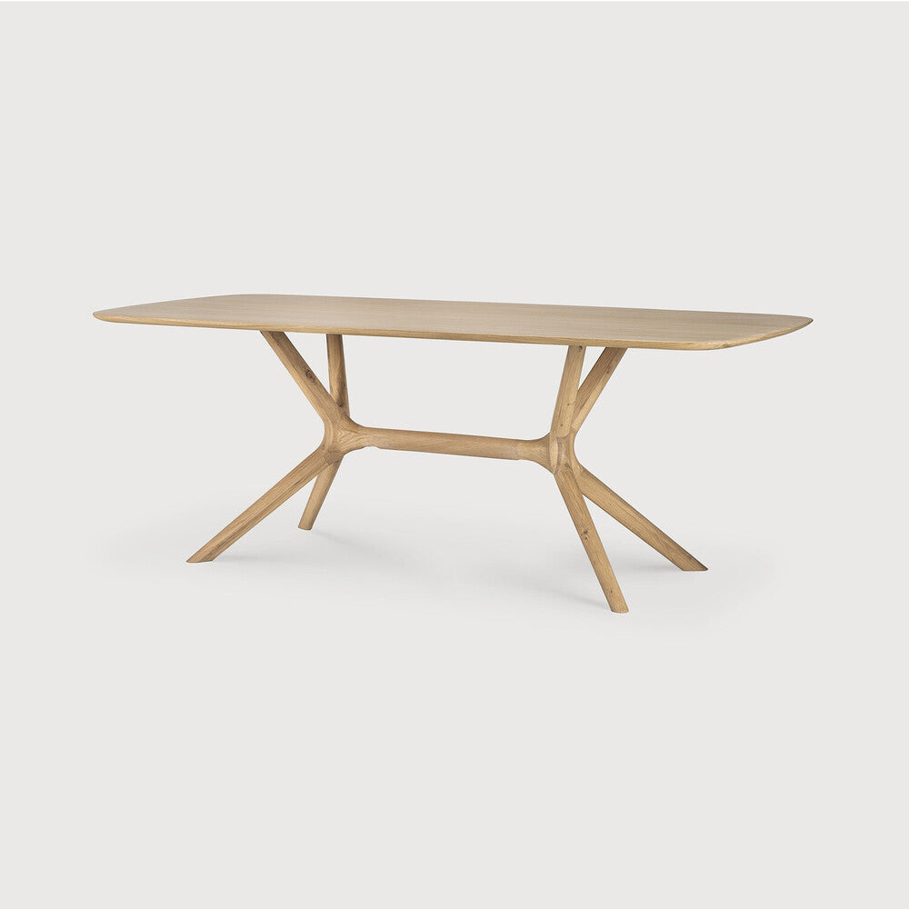 Featuring X Oak Rectangular Dining Table by Ethnicraft at Amethyst Home. Complex in its simplicity. The X table’s sturdy, yet intricate, construction is a true work of art and a credit to the most advanced woodworking techniques. With a seamless structural interplay between the unique shape of the legs and the soft lines of the tabletop, guests will enjoy the most comfortable seat. Amethyst Home provides interior design, new construction, custom furniture, and area rugs in the Calabasas metro area