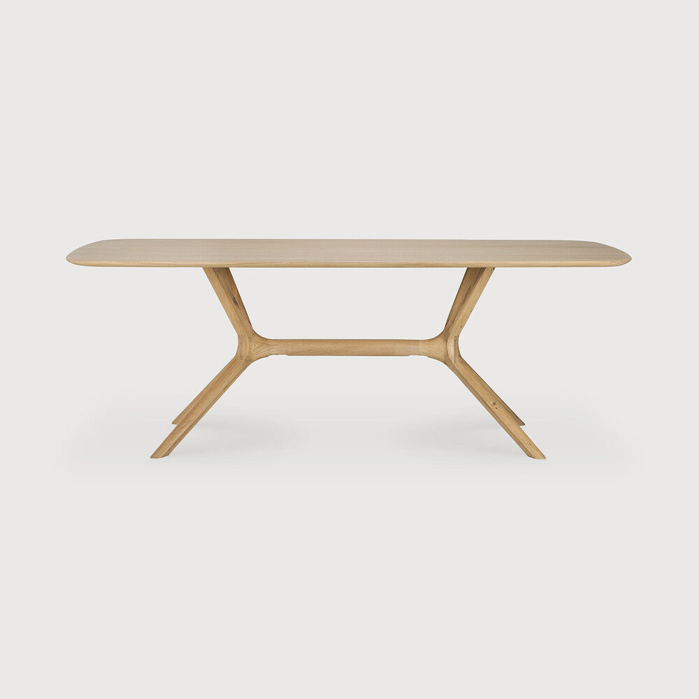 Featuring X Oak Rectangular Dining Table by Ethnicraft at Amethyst Home. Complex in its simplicity. The X table’s sturdy, yet intricate, construction is a true work of art and a credit to the most advanced woodworking techniques. With a seamless structural interplay between the unique shape of the legs and the soft lines of the tabletop, guests will enjoy the most comfortable . Amethyst Home provides interior design, new construction, custom furniture, and area rugs in the Newport Beach metro area