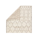 Soft and luxurious in feel, the Zuri Turtledove/Walnut area rug by Jaipur Living is a modern take on a classic Moroccan area rug. The Zuri is made from supple hand-knotted, 100% wool in natural tones of ivory and brown. This rug would be perfect for a living room, bedroom, or hallway in the runner size.