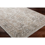 Featuring Hightower Brown Hand-Knotted Rug by Surya at Amethyst Home. The Hightower Collection showcases traditional inspired designs that exemplify timeless styles of elegance, comfort, and sophistication. With their Hand-Knotted construction, these rugs provide a durability that can not be found in other handmade constructions, and boasts the ability t.  Amethyst Home provides interior design, new home construction design consulting, vintage area rugs, and lighting in the Los Angeles metro area.